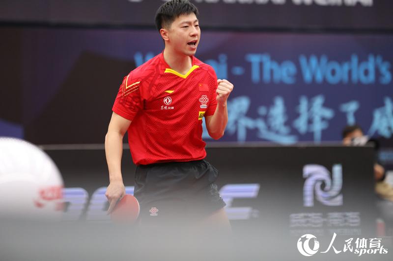 马龙庆祝得分（人民网 赵欣悦摄）