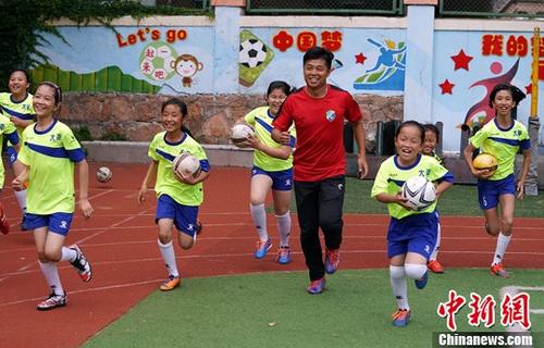 资料图:中国足球的未来。中新社记者 毛建军 摄 资料图:中国足球的未来。/p中新社记者 毛建军 摄