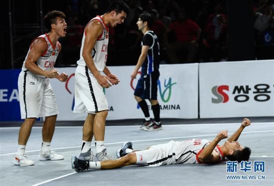 资料图：在第18届亚运会男子三人篮球决赛中，中国队以19比18战胜韩国队，获得冠军。 图片来源：新华网 记者李响摄