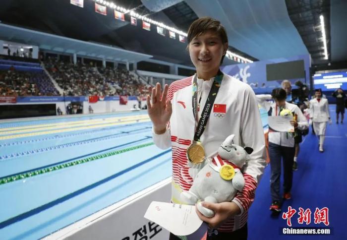 资料图：在第18届亚运会女子1500米自由泳决赛中，中国选手王简嘉禾以15分53秒68的成绩夺冠。/p中新社记者 杜洋 摄