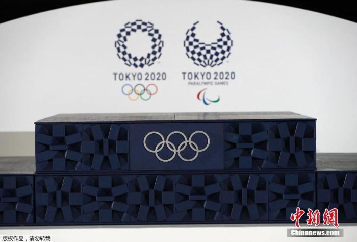 当地时间6月3日，东京奥运会倒计时50天纪念仪式在在东京有明体育馆举行。图为奥运会颁奖典礼领奖台在仪式上亮相。