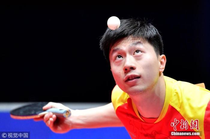 资料图：2018年世乒赛，马龙在比赛中。图片来源：视觉中国