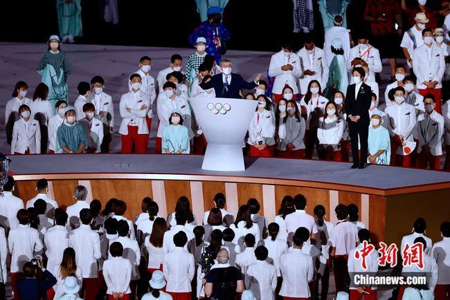 国际奥委会主席巴赫致辞。/p中新社记者 富田 摄